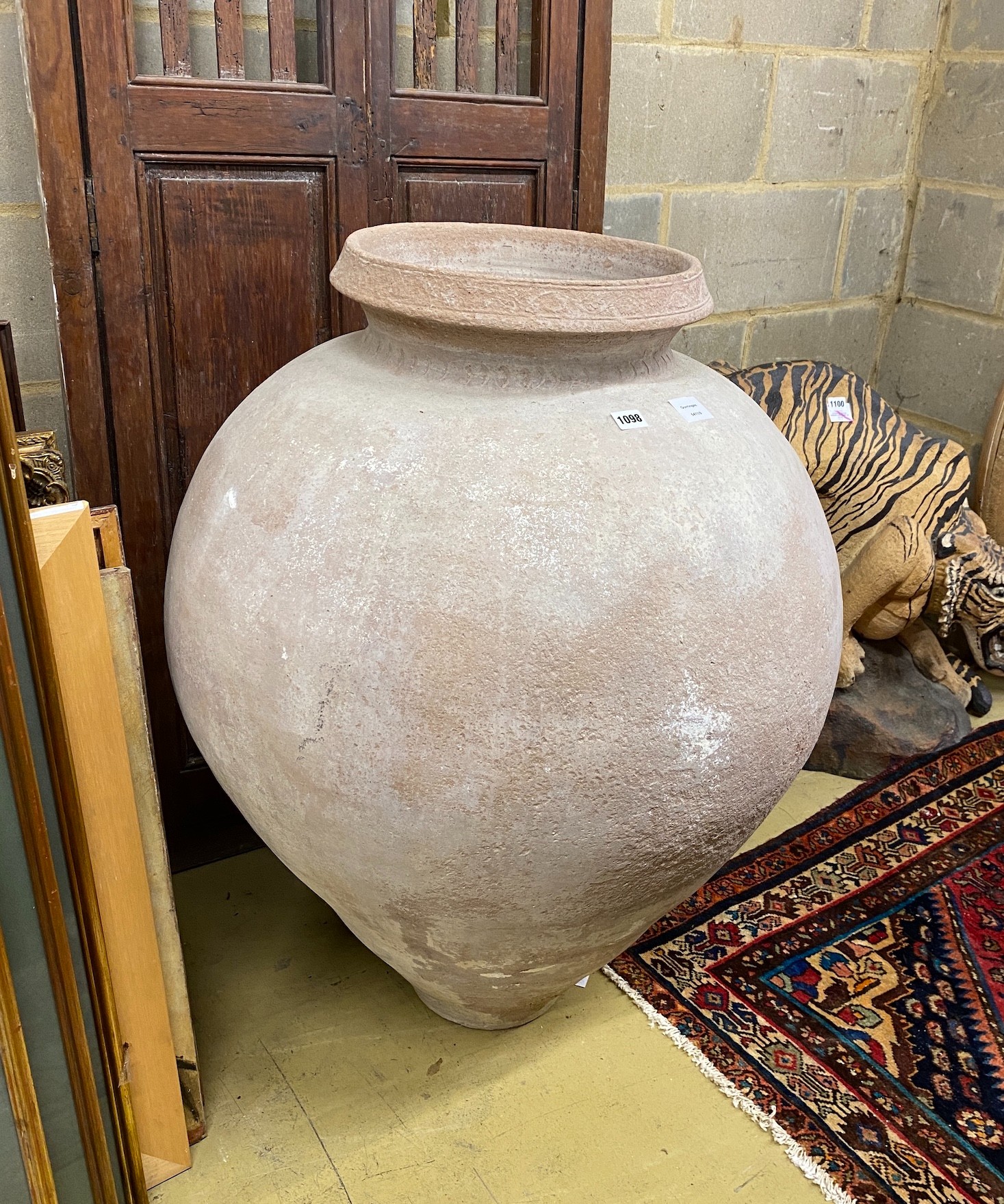 A larger circular earthenware garden urn, height 94cm